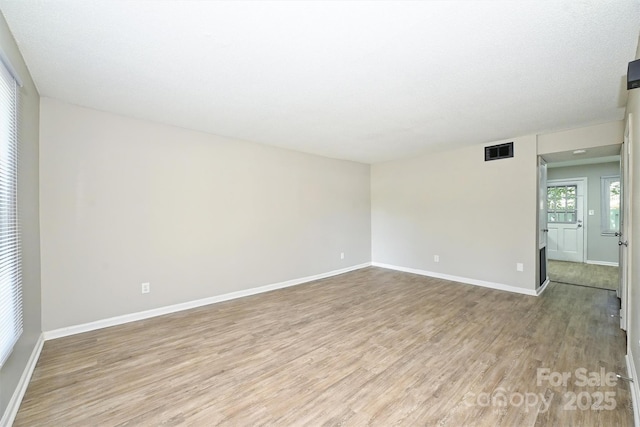 1931 Mereview Ct Unit 46, Charlotte, NC 28210 - unfurnished room featuring light wood-style floors and baseboards