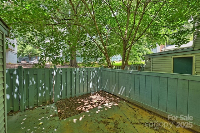 1931 Mereview Ct Unit 46, Charlotte, NC 28210 - fenced backyard with a patio area