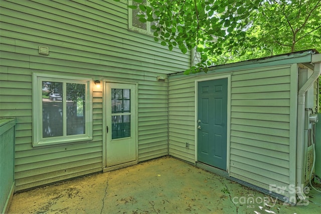 1931 Mereview Ct Unit 46, Charlotte, NC 28210 - view of exterior entry featuring a patio area