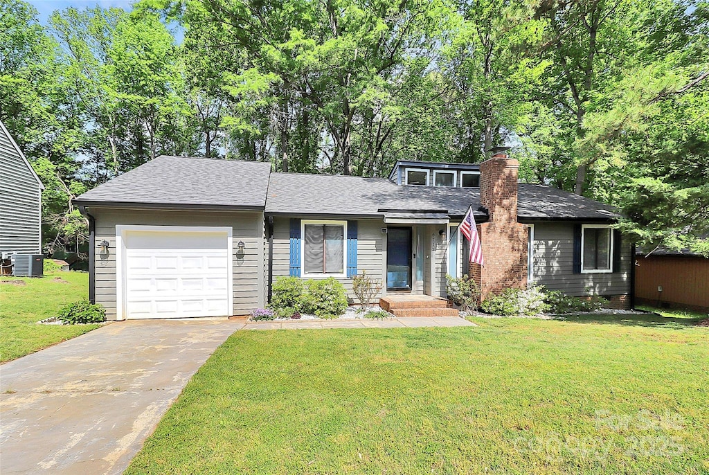 6712 Santa Maria Ln, Charlotte, NC 28227 - view of front of house with driveway, a chimney, roof with shingles, a front yard, and an attached garage