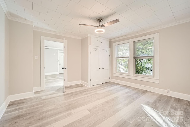 828 Richard Ave, Kannapolis, NC 28081 - spare room featuring light wood finished floors, a ceiling fan, baseboards, and ornamental molding