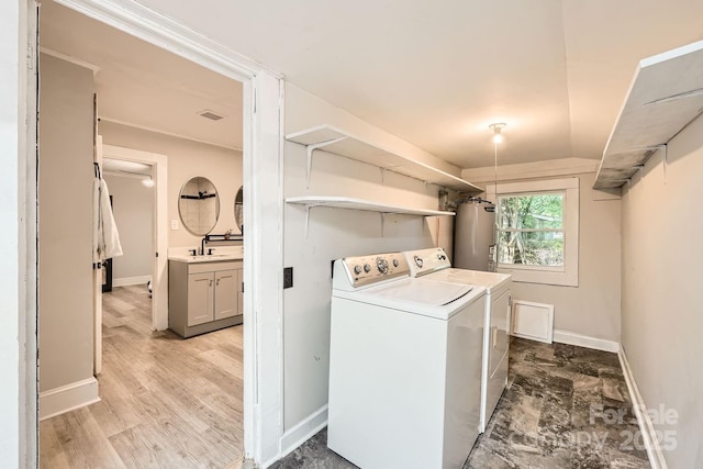 828 Richard Ave, Kannapolis, NC 28081 - laundry room featuring laundry area, visible vents, independent washer and dryer, gas water heater, and baseboards