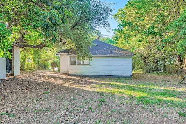 828 Richard Ave, Kannapolis, NC 28081 - exterior space with a chimney, crawl space, and a shingled roof