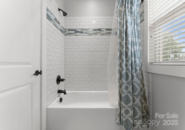full bathroom with shower / bath combo