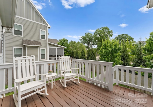 deck featuring a sunroom
