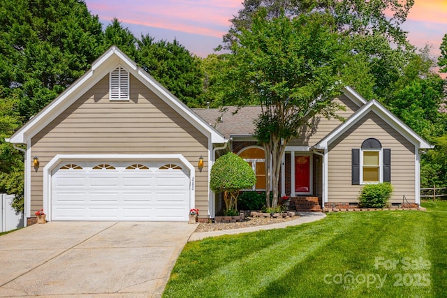ranch-style house featuring fence, a lawn, driveway, and crawl space
