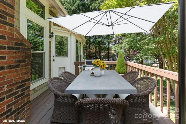 deck with outdoor dining space