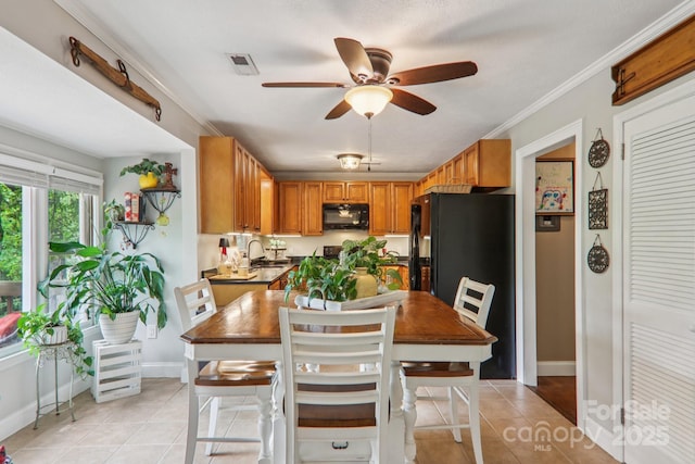 416 S Cherokee Ave, Black Mountain, NC 28711 - kitchen featuring black appliances, ceiling fan, light tile patterned floors, a sink, and baseboards
