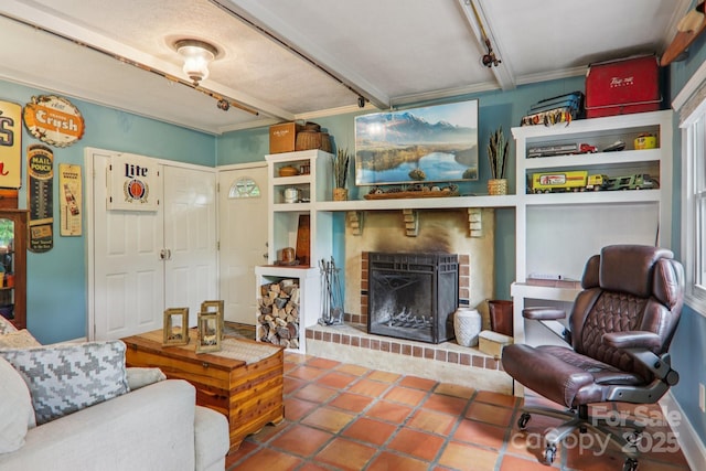 416 S Cherokee Ave, Black Mountain, NC 28711 - tiled living area with a fireplace, beam ceiling, and crown molding