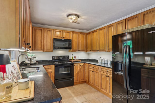 416 S Cherokee Ave, Black Mountain, NC 28711 - kitchen with black appliances, a sink, light tile patterned floors, and brown cabinetry