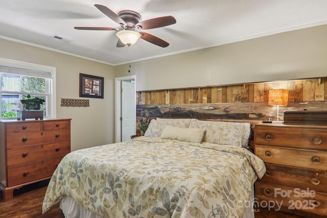 416 S Cherokee Ave, Black Mountain, NC 28711 - bedroom with dark wood-style flooring, crown molding, and ceiling fan