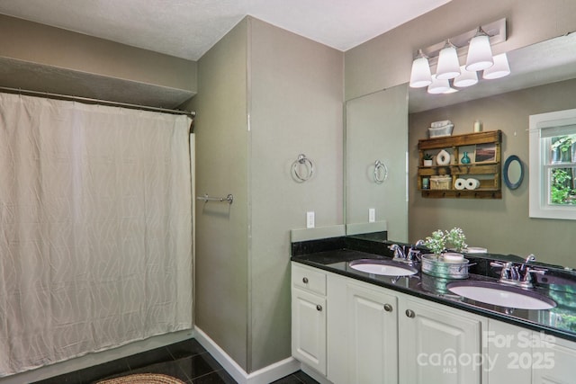 416 S Cherokee Ave, Black Mountain, NC 28711 - bathroom featuring double vanity, tile patterned floors, and a shower with curtain