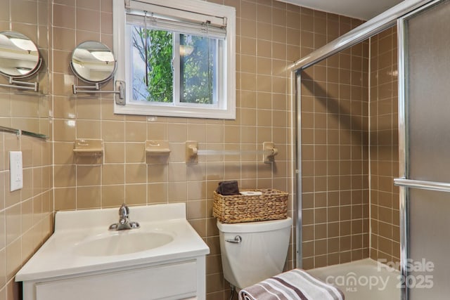 416 S Cherokee Ave, Black Mountain, NC 28711 - bathroom with vanity, tile walls, enclosed tub / shower combo, and backsplash