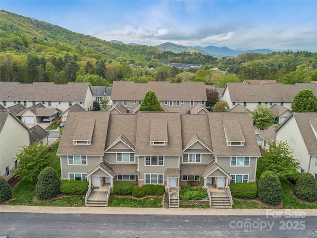 aerial view featuring a residential view and a mountain view
