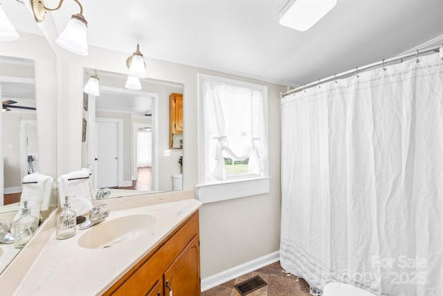 406 S Gaston St, Dallas, NC 28034 - full bath featuring baseboards, toilet, vanity, and visible vents