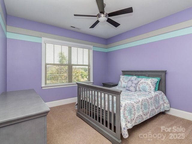 bedroom featuring ceiling fan, carpet floors, visible vents, and baseboards