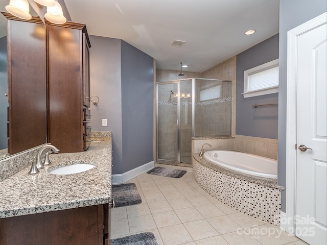 bathroom with a shower stall, a garden tub, vanity, tile patterned flooring, and visible vents