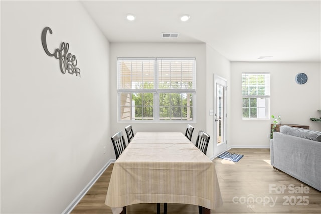 7004 Everly Commons Ln, Tega Cay, SC 29708 - dining area with baseboards, wood finished floors, visible vents, and recessed lighting