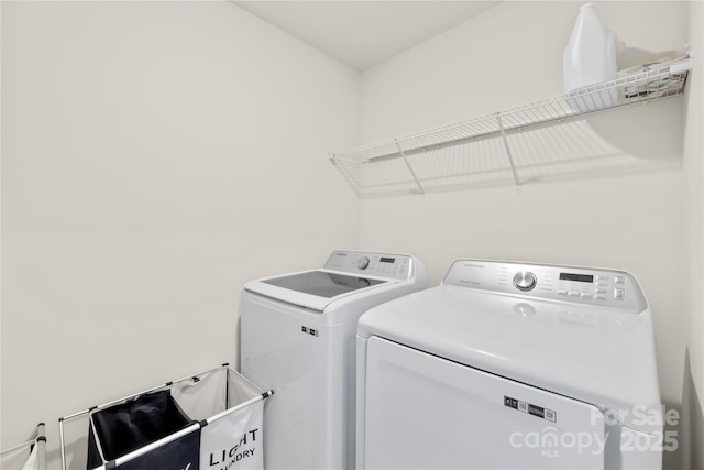 7004 Everly Commons Ln, Tega Cay, SC 29708 - laundry area featuring independent washer and dryer and laundry area