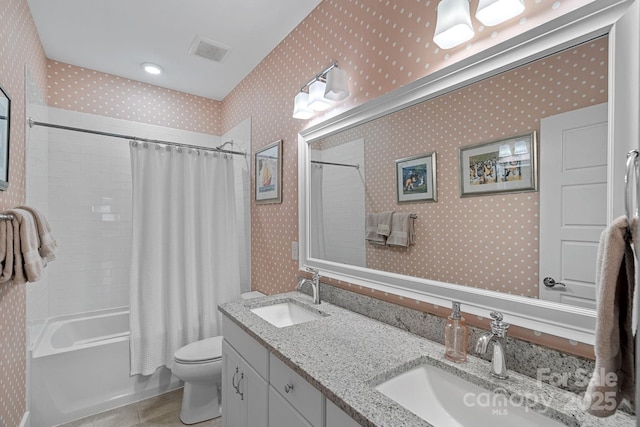309 Catawba Ave, Davidson, NC 28036 - bathroom with shower / bath combination with curtain, double vanity, toilet, and wallpapered walls