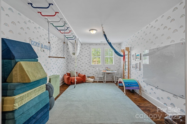 309 Catawba Ave, Davidson, NC 28036 - rec room featuring wallpapered walls, wood finished floors, and baseboards