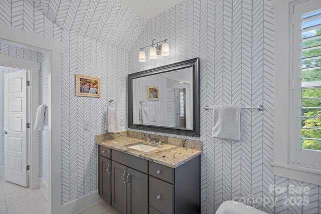 309 Catawba Ave, Davidson, NC 28036 - bathroom with vanity and wallpapered walls