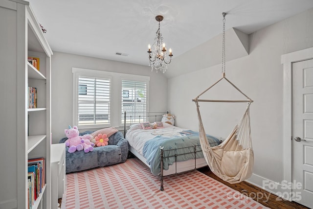309 Catawba Ave, Davidson, NC 28036 - bedroom featuring a chandelier