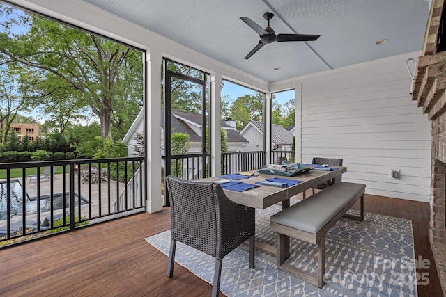 309 Catawba Ave, Davidson, NC 28036 - sunroom with a ceiling fan and outdoor dining space