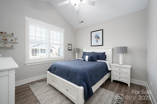 bedroom with vaulted ceiling, baseboards, visible vents, and dark wood-style floors
