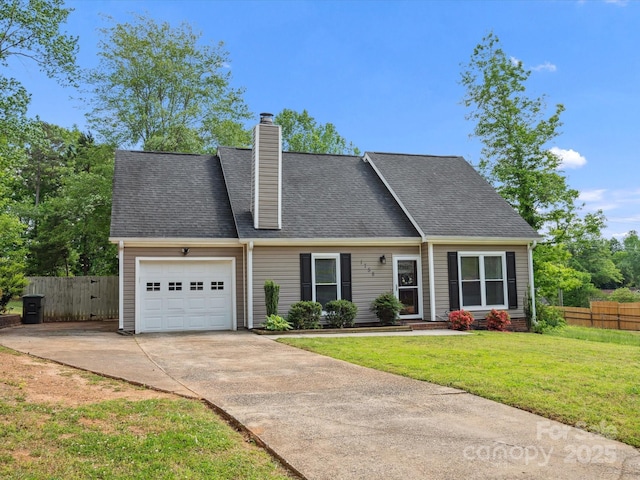 new england style home with fence, an attached garage, a front yard, a chimney, and concrete driveway