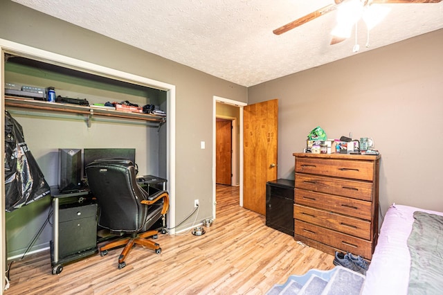 1300 Math Pl, Lenoir, NC 28645 - bedroom featuring a textured ceiling, ceiling fan, and wood finished floors
