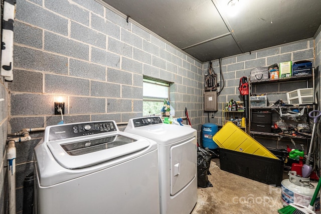 1300 Math Pl, Lenoir, NC 28645 - clothes washing area featuring independent washer and dryer and concrete block wall