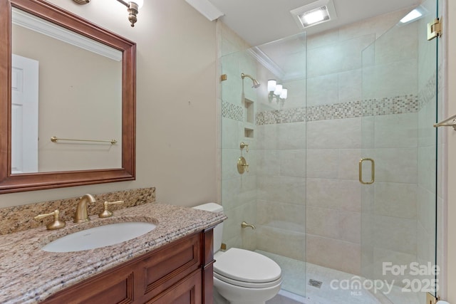 111 Broadmoor Dr, Flat Rock, NC 28731 - full bath with ornamental molding, toilet, vanity, visible vents, and a stall shower