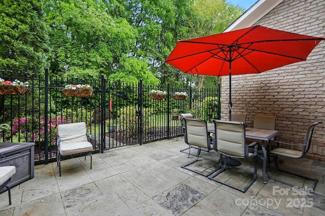 view of patio / terrace with fence and outdoor dining space