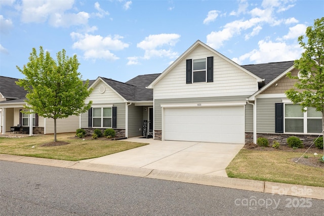 1125 Silvertrace Dr, Salisbury, NC 28144 - view of front facade featuring a garage, a front yard, stone siding, a shingled roof, and driveway