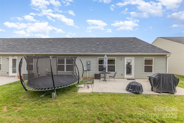 1125 Silvertrace Dr, Salisbury, NC 28144 - rear view of house featuring a yard, a patio, central AC, and a trampoline