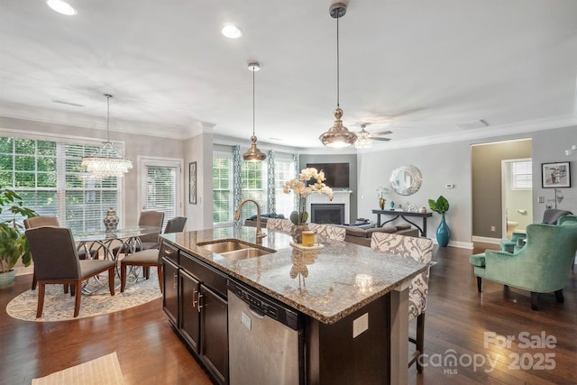 13402 David Jennings Ave, Charlotte, NC 28213 - kitchen featuring a fireplace, dishwasher, a sink, ceiling fan with notable chandelier, and ornamental molding