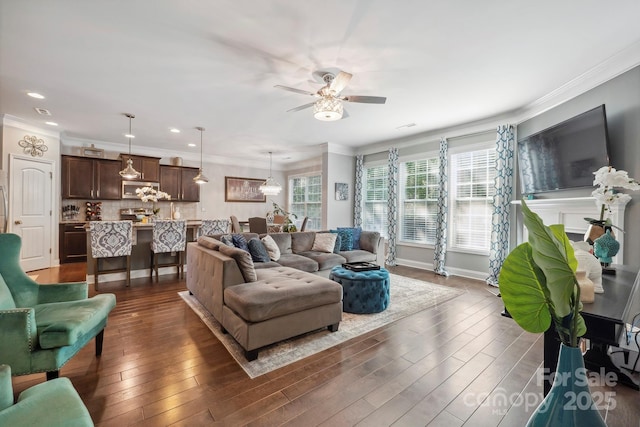 13402 David Jennings Ave, Charlotte, NC 28213 - living room featuring crown molding, a ceiling fan, dark wood finished floors, and recessed lighting