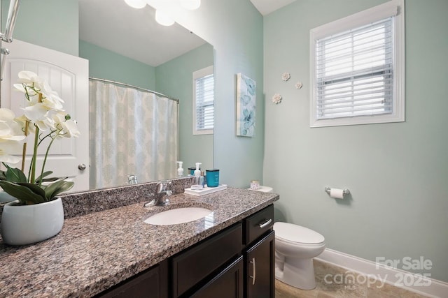 13402 David Jennings Ave, Charlotte, NC 28213 - bathroom with vanity, baseboards, toilet, and a shower with shower curtain