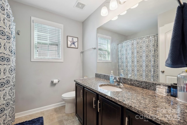 13402 David Jennings Ave, Charlotte, NC 28213 - bathroom with visible vents, baseboards, vanity, toilet, and a shower with shower curtain