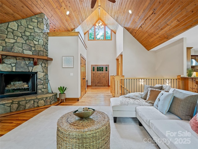14 Sweet Gum Hl, Fletcher, NC 28732 - living area with wood finished floors, wooden ceiling, a ceiling fan, baseboards, and a fireplace