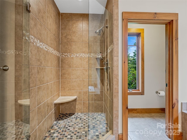 14 Sweet Gum Hl, Fletcher, NC 28732 - bathroom featuring a stall shower, tile patterned flooring, and baseboards