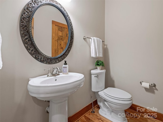 14 Sweet Gum Hl, Fletcher, NC 28732 - half bathroom with toilet, wood finished floors, and baseboards
