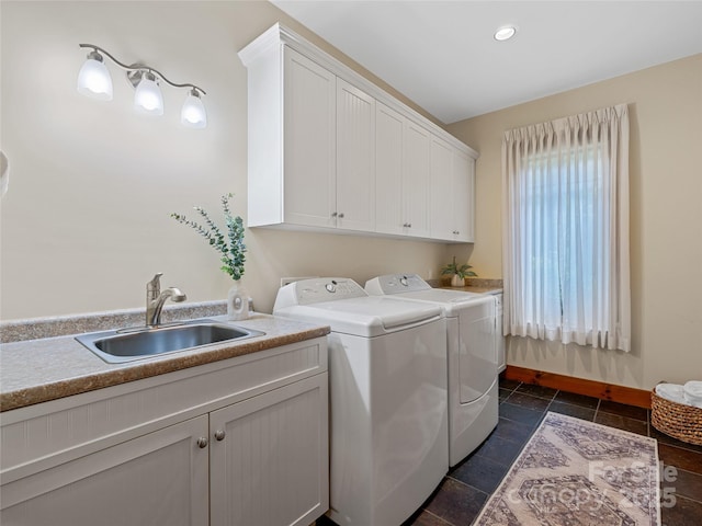 14 Sweet Gum Hl, Fletcher, NC 28732 - laundry area featuring separate washer and dryer, cabinet space, and baseboards