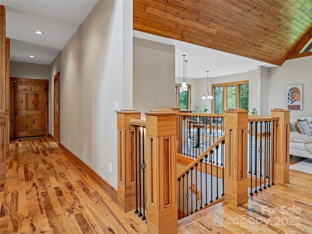 14 Sweet Gum Hl, Fletcher, NC 28732 - hallway with an upstairs landing, wood finished floors, baseboards, and recessed lighting