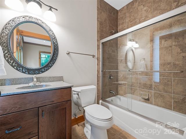 14 Sweet Gum Hl, Fletcher, NC 28732 - bathroom featuring vanity, toilet, bath / shower combo with glass door, and tile patterned floors