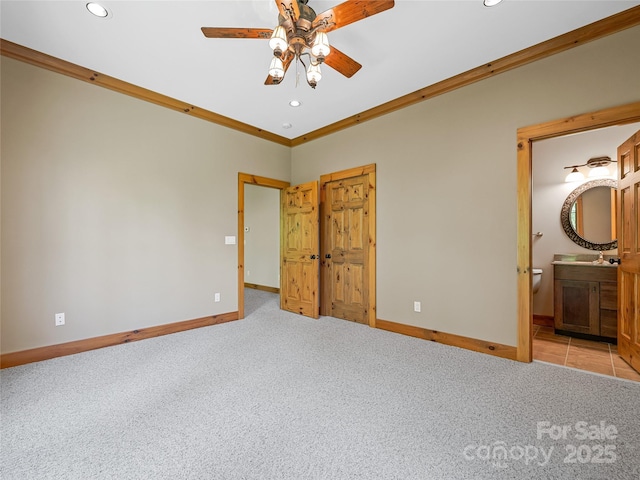 14 Sweet Gum Hl, Fletcher, NC 28732 - unfurnished bedroom with recessed lighting, carpet, baseboards, crown molding, and a sink