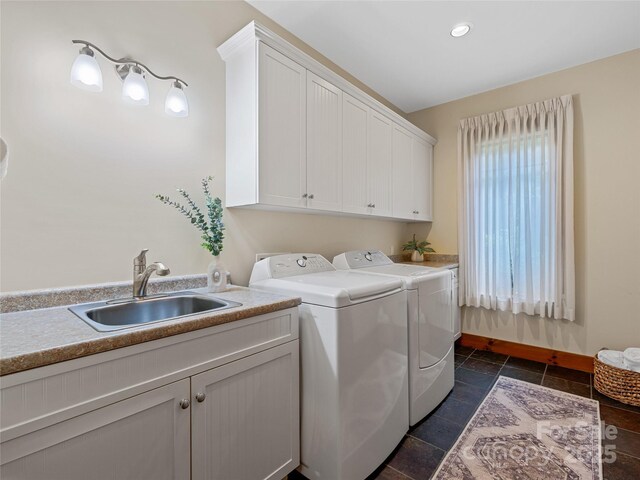 14 Sweet Gum Hl, Fletcher, NC 28732 - washroom with separate washer and dryer, cabinet space, and baseboards