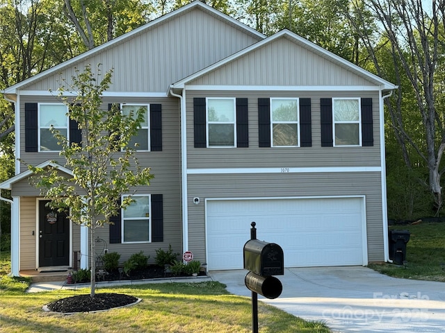 1070 Glenbriar Ct, Woodleaf, NC 27054 - traditional-style home with a garage, a front yard, and concrete driveway