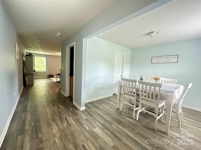 1070 Glenbriar Ct, Woodleaf, NC 27054 - dining area with baseboards and wood finished floors